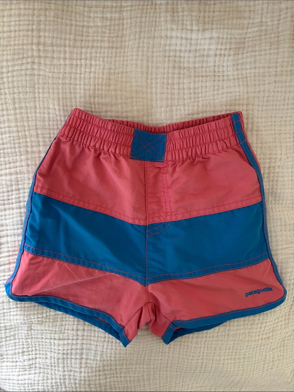 Patagonia Board Shorts in 5t. Colorblock in coral pink/red and blue